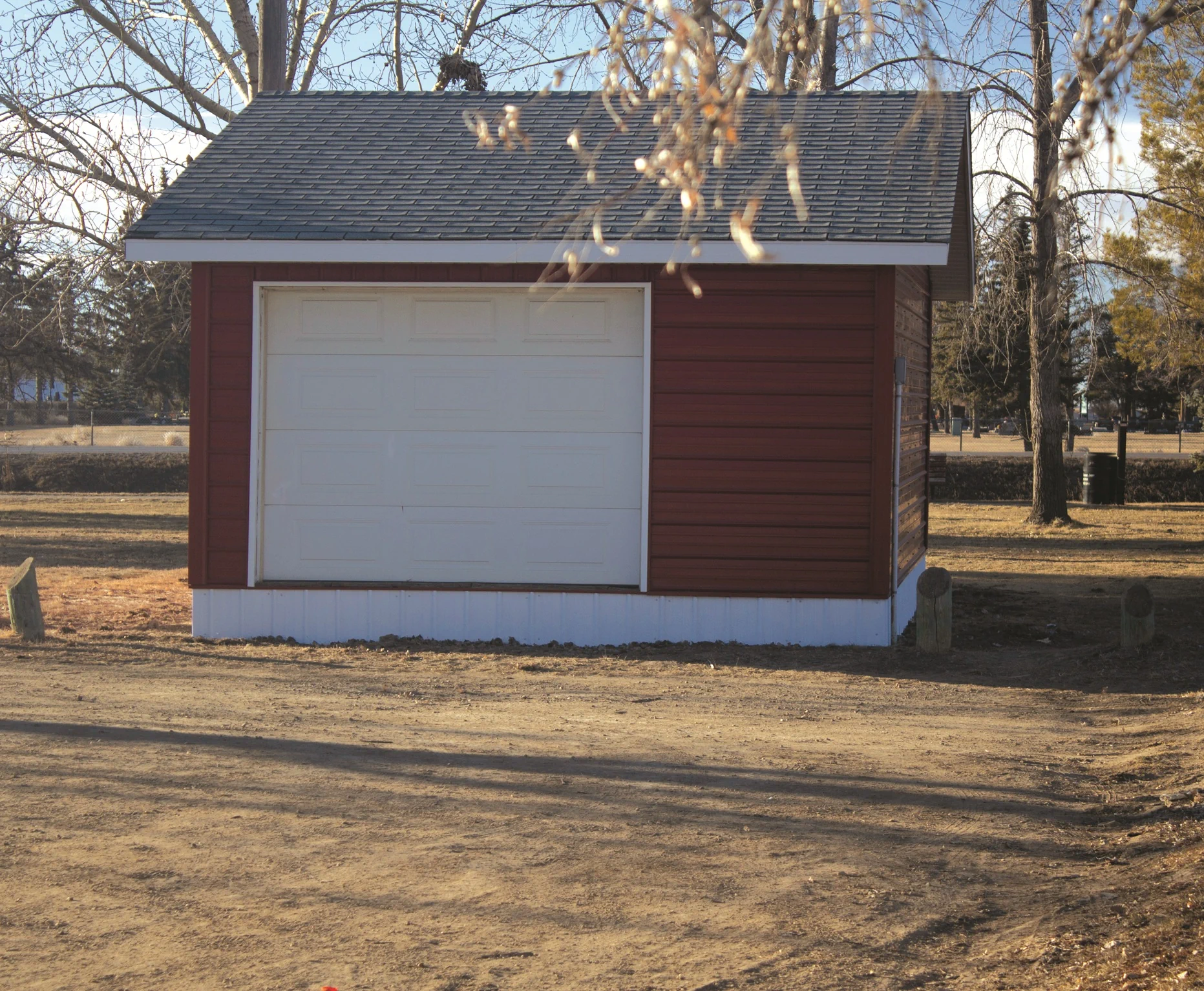A group of formally dressed men and women posing for a leadership photo in front of an orange District banner